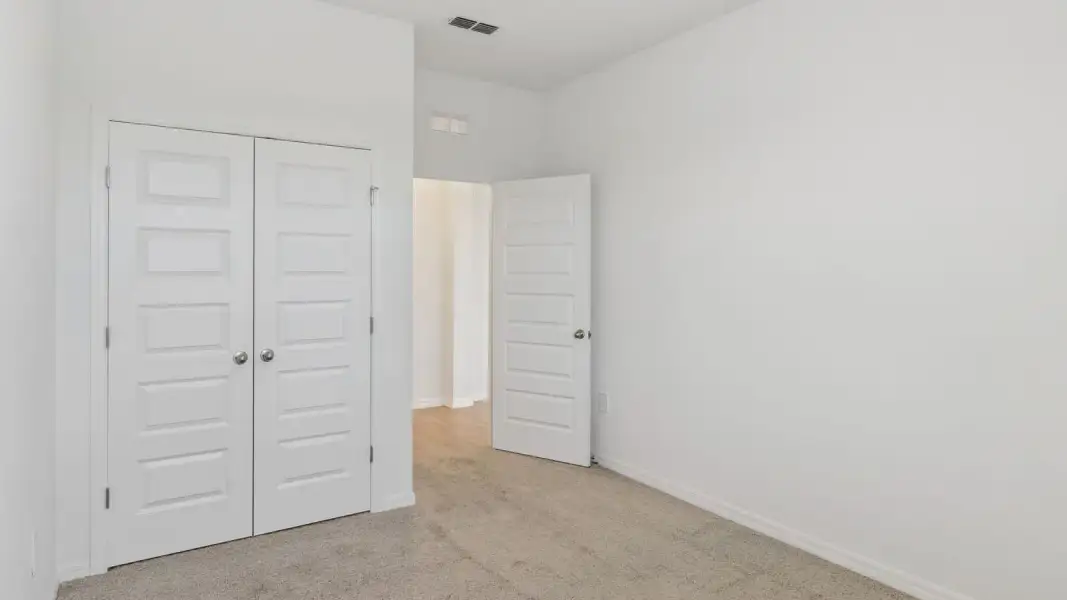 Representative unfurnished interior of a home built from the Coral by D.R. Horton in Hawthorne Ranch, Lakeland (Image 47).