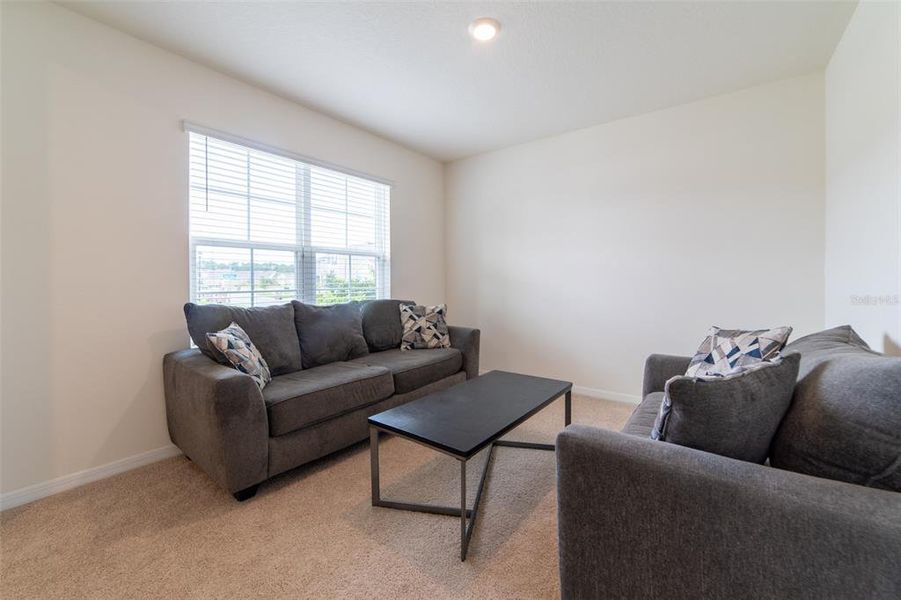 Furnished interior view inside a new home in , Harmony (Image 19).
