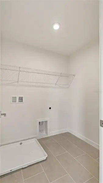 Furnished interior view inside a new home in Grasslands West, Lakeland (Image 7). Furnished interior view inside a new home in Grasslands West, Lakeland (Image 7).