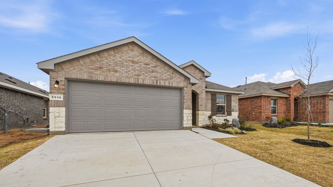 Representative exterior photo of a completed home built from the Dalton by D.R. Horton in Hickory Grove, Krum, TX (Image 23).