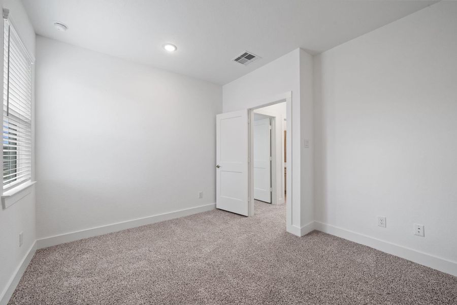 Spacious, unfurnished interior of a new home in Meridiana, Manvel (Image 26). Spacious, unfurnished interior of a new home in Meridiana, Manvel (Image 26).