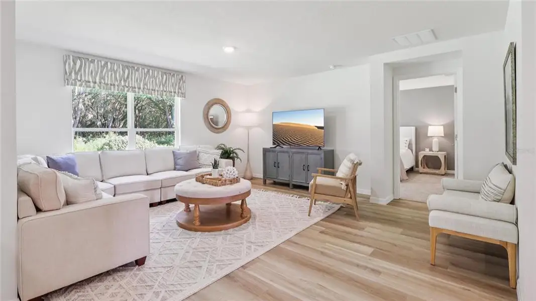 Furnished interior view inside a new home in Triumph South, Wildwood (Image 4).