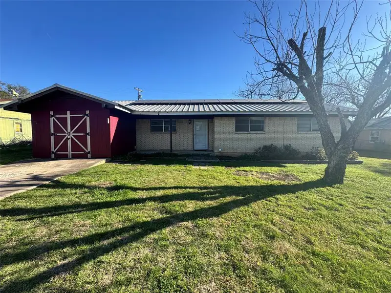 Exterior details and patio area of a home in , Brownwood (Image 16). Exterior details and patio area of a home in , Brownwood (Image 16).