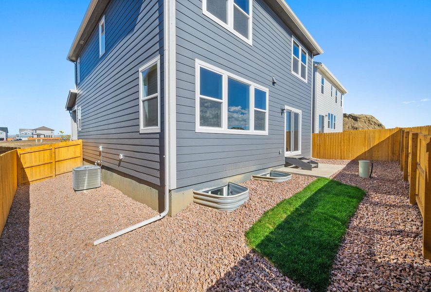 Exterior details and patio area of a home in Ridge at Lorson Ranch, Colorado Springs (Image 21). Exterior details and patio area of a home in Ridge at Lorson Ranch, Colorado Springs (Image 21).
