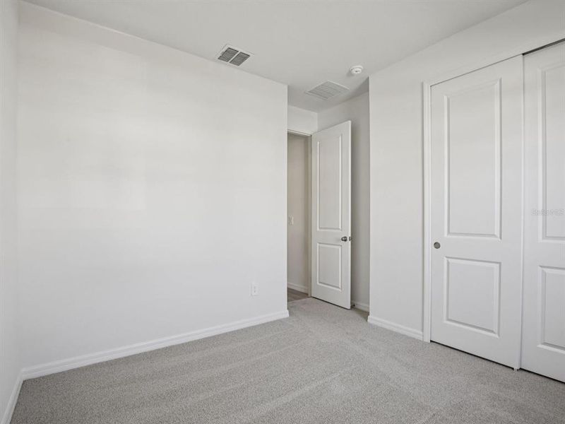 Spacious, unfurnished interior of a new home in Coasterra - Reserve Series, Palmetto (Image 18).