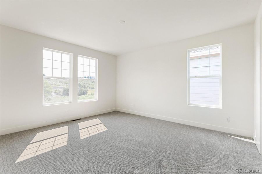 Spacious, unfurnished interior of a new home in Terrain Oak Valley, Castle Rock (Image 16).