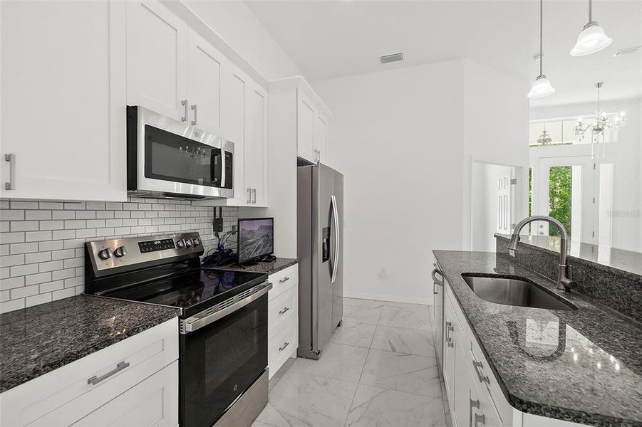 Furnished interior view inside a new home in , Pierson (Image 5).