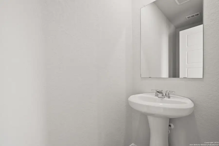 Close-up of interior finishes inside a home in Katzer Ranch, Converse (Image 11).