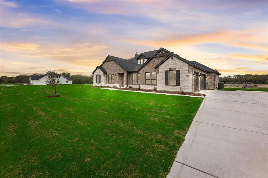 Front exterior of a new home in King Crossing Estates, Van Alstyne, TX, highlighting curb appeal (Image 24).
