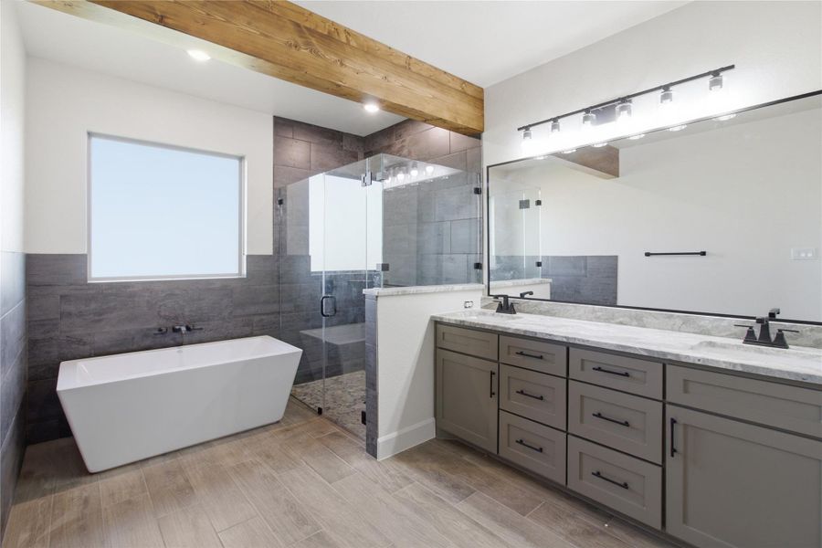 Luxurious bath with freestanding tub and spacious dual vanity. Luxurious bath with freestanding tub and spacious dual vanity.