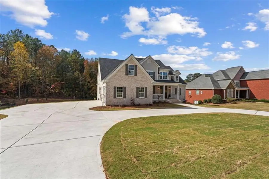 Exterior details and patio area of a home in , Carrollton (Image 3).