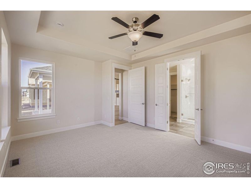 Spacious, unfurnished interior of a new home in RainDance National 60/70, Windsor (Image 22).