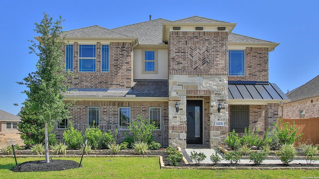 Front exterior of a new home in Prairie Green, Converse, TX, highlighting curb appeal (Image 1). Front exterior of a new home in Prairie Green, Converse, TX, highlighting curb appeal (Image 1).