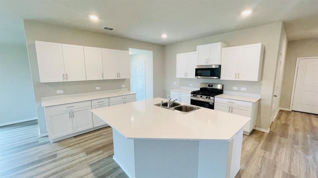 Kitchen - All Home and community information, including pricing, included features, terms, availability and amenities, are subject to change at any time without notice or obligation. All Drawings, pictures, photographs, video, square footages, floor plans, elevations, features, colors and sizes are approximate for illustration purposes only and will vary from the homes as built.