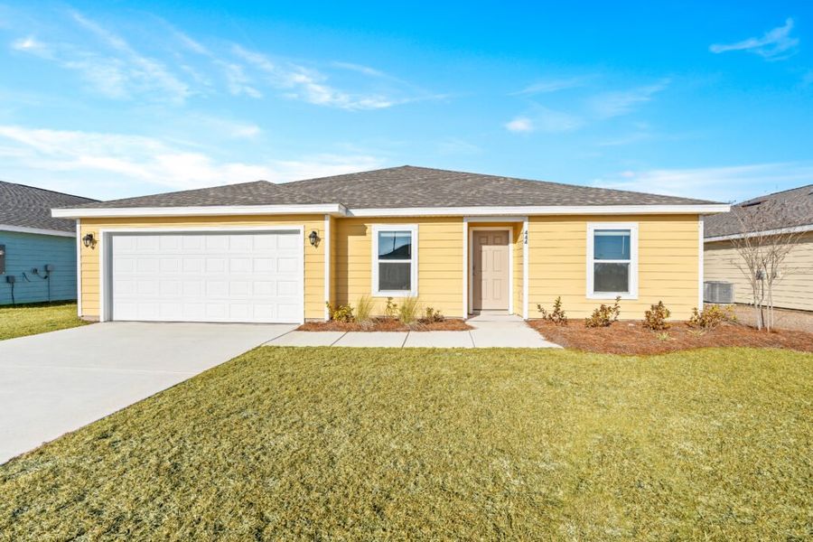 Front exterior of a new home in Salt Creek At Mexico Beach, Mexico Beach, FL, highlighting curb appeal (Image 1). Front exterior of a new home in Salt Creek At Mexico Beach, Mexico Beach, FL, highlighting curb appeal (Image 1).