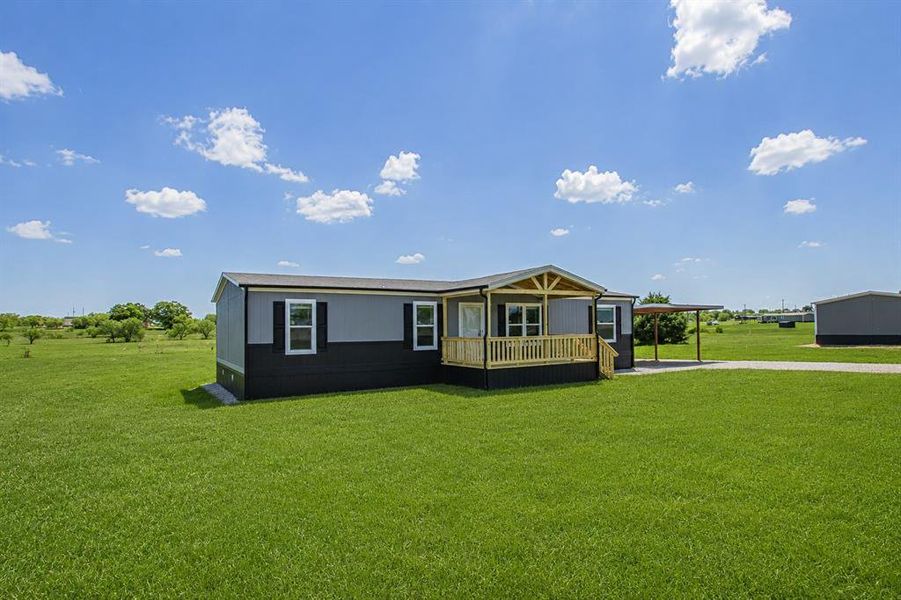 Exterior details and patio area of a home in , Poolville (Image 23).