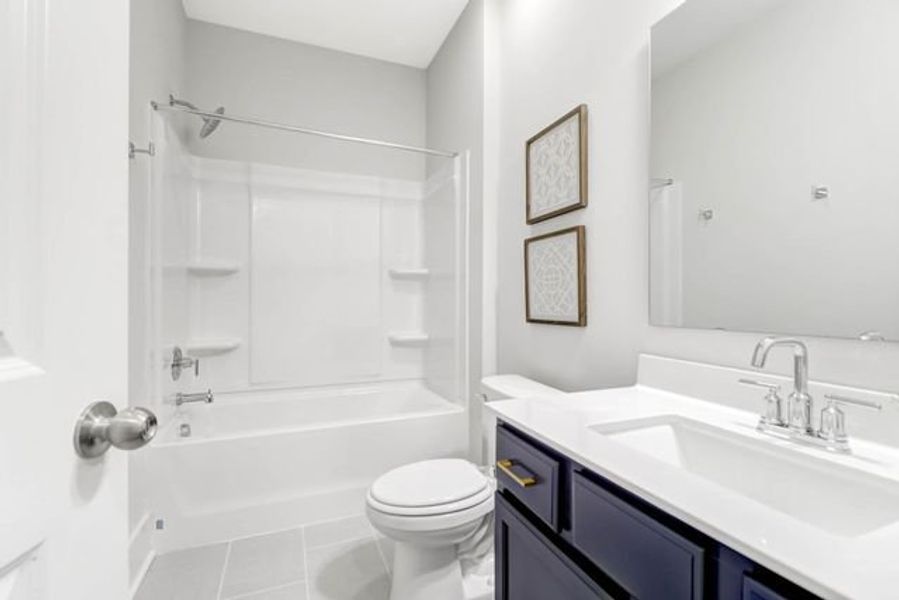 Representative furnished interior of a home built from the Milo P by True Homes in Homecoming, Ravenel (Image 18).