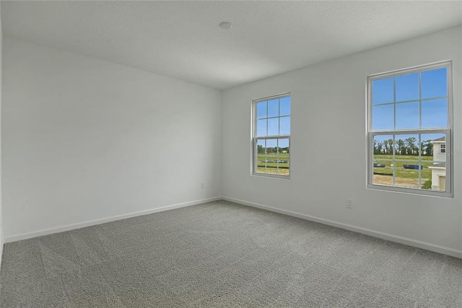 Spacious, unfurnished interior of a new home in Seasons at Aurora Oaks, Ocala (Image 15).