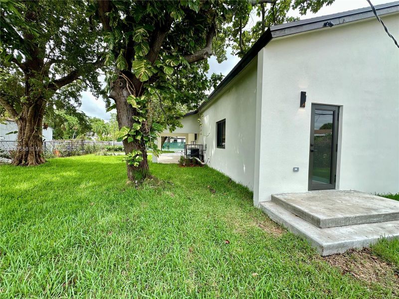 Front exterior of a new home in , Miami, FL, highlighting curb appeal (Image 20).