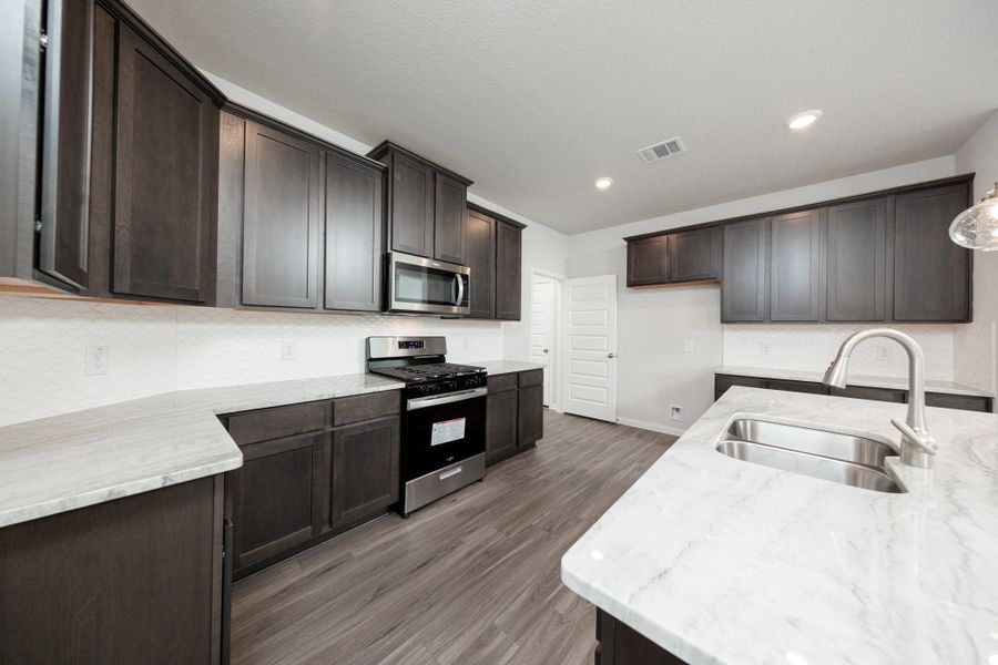 Photos are a representation of the floor plan. Options and interior selections will vary.