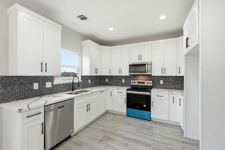 Furnished interior view inside a new home in , Trinity (Image 6).