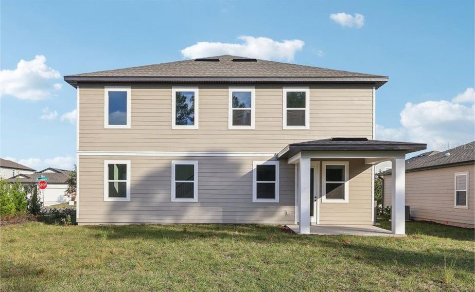 Exterior details and patio area of a home in Ellington Traditional, St. Cloud (Image 14).