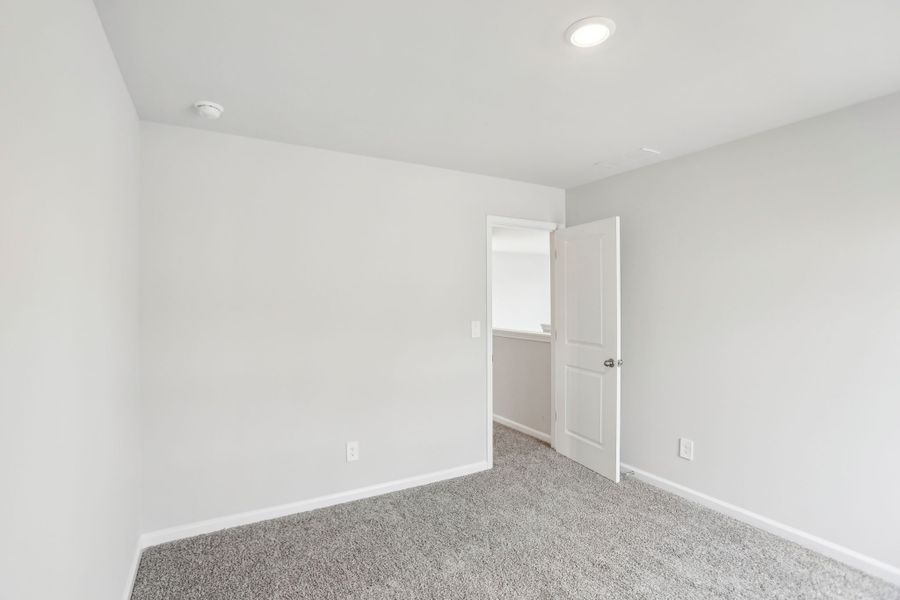 Spacious, unfurnished interior of a new home in Hemingway - Reserve Series, Cumming (Image 18). Spacious, unfurnished interior of a new home in Hemingway - Reserve Series, Cumming (Image 18).