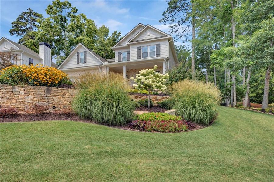 Front exterior of a new home in , Covington, GA, highlighting curb appeal (Image 1). Front exterior of a new home in , Covington, GA, highlighting curb appeal (Image 1).