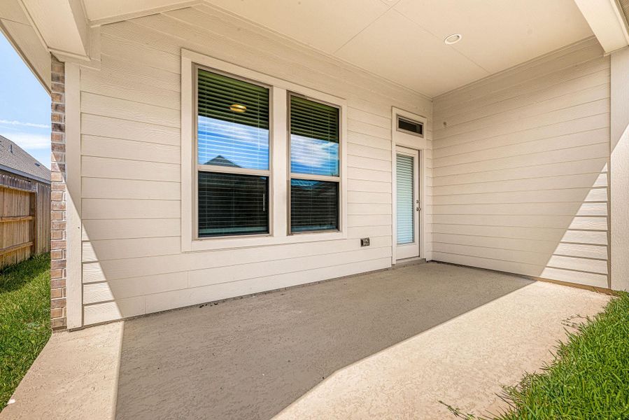 Exterior details and patio area of a home in The Grand Prairie, Hockley (Image 21).