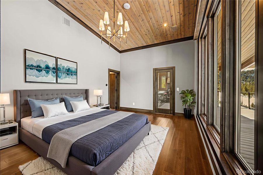 Virtually staged main floor bedroom with ensuite Virtually staged main floor bedroom with ensuite