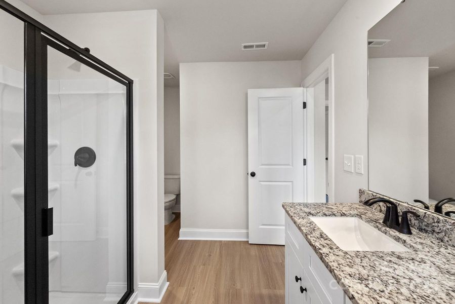 Furnished interior view inside a new home in Stagecoach Station, Gastonia (Image 5).
