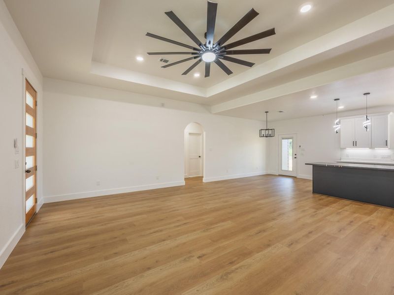 A beautiful blend of natural elements and clean lines greet you at the front entry. The frosted glass panel front door and large windows bring warmth and style into the space. A beautiful blend of natural elements and clean lines greet you at the front entry. The frosted glass panel front door and large windows bring warmth and style into the space.