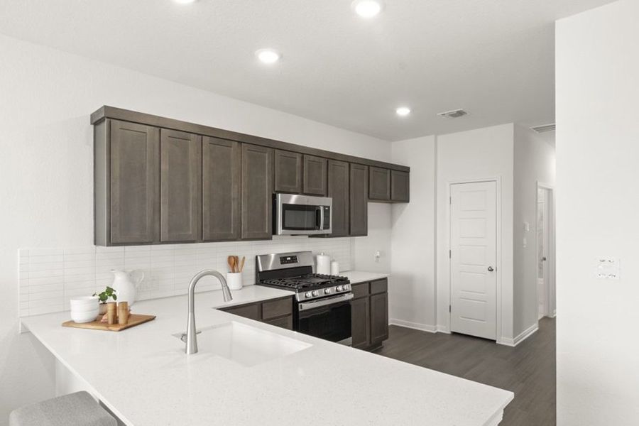 Representative furnished interior of a home built from the Ash by Pacesetter Homes in Blanco Vista, San Marcos (Image 4).