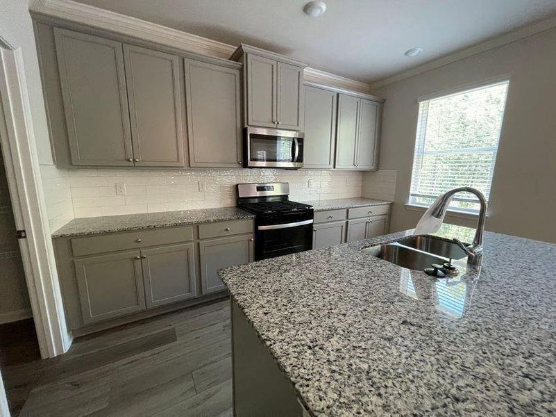 Furnished interior view inside a new home in Autumn Brook, Austell (Image 5).
