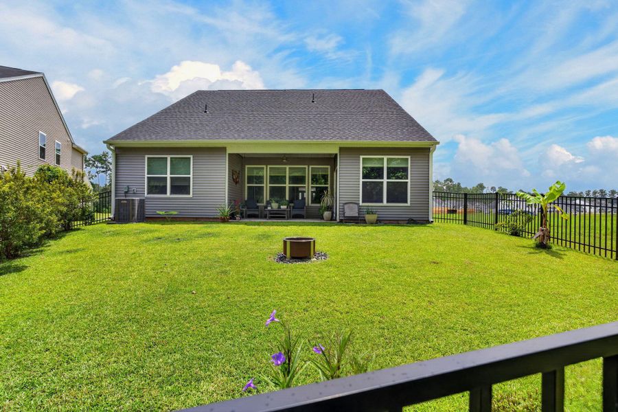 Exterior details and patio area of a home in , Ridgeville (Image 28).