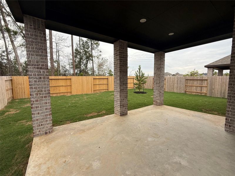 Exterior details and patio area of a home in Evergreen, Conroe (Image 2).