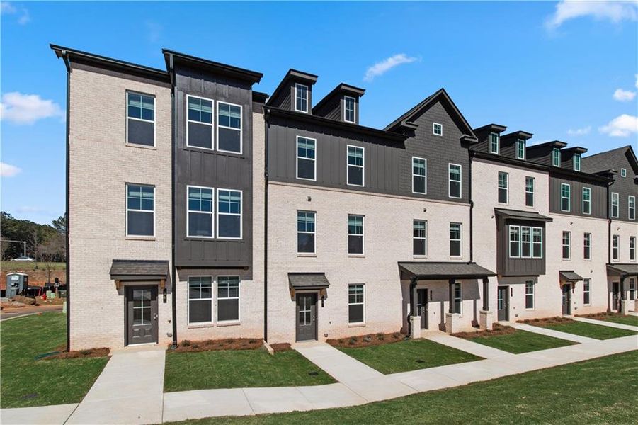 Front exterior of a new home in Daybreak, Newnan, GA, highlighting curb appeal (Image 23).