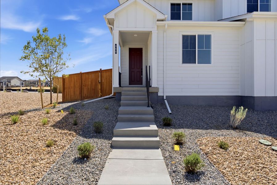 Exterior details and patio area of a home in Sky Ranch, Watkins (Image 4).