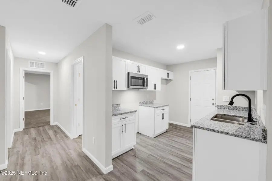 Furnished interior view inside a new home in , Jacksonville (Image 4).