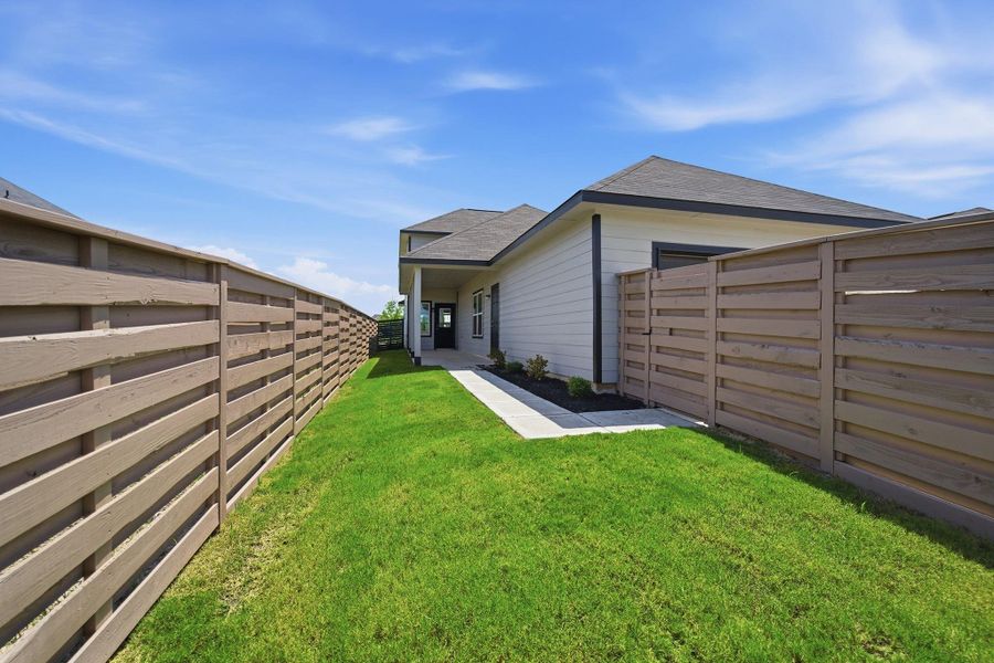 Exterior details and patio area of a home in Austin Point, Richmond (Image 2).