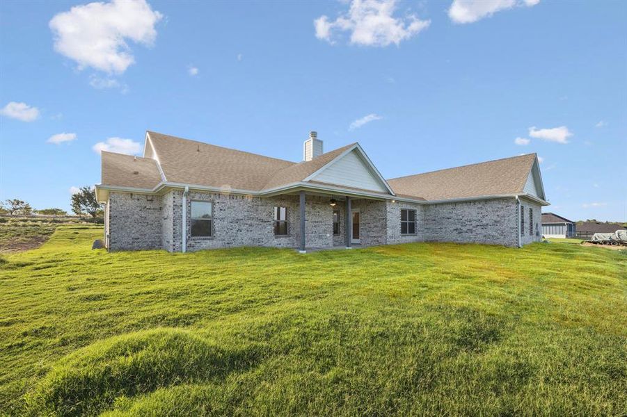 Front exterior of a new home in The Reserve At Brock, Weatherford, TX, highlighting curb appeal (Image 21).