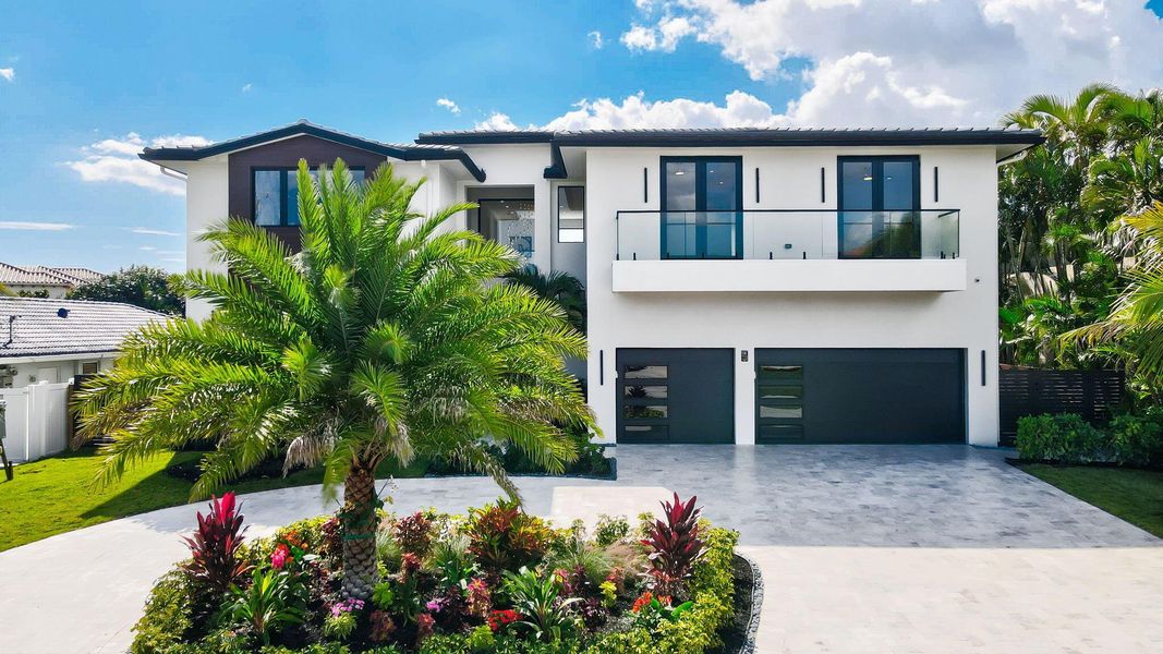 Front exterior of a new home in , Boca Raton, FL, highlighting curb appeal (Image 30). Front exterior of a new home in , Boca Raton, FL, highlighting curb appeal (Image 30).