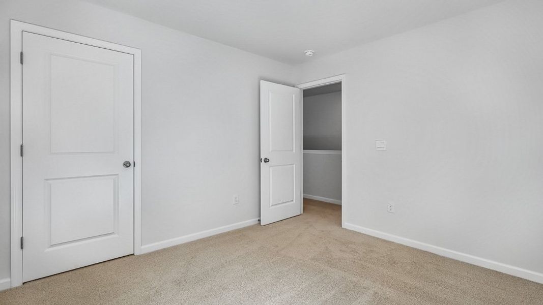 Spacious, unfurnished interior of a new home in The Landing at Summerhaven, Mebane (Image 24).