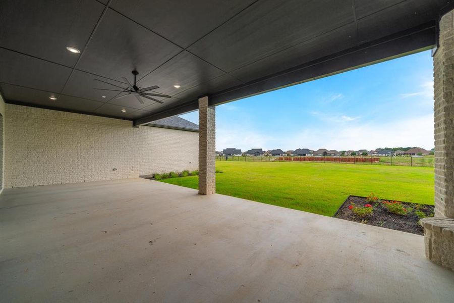 View of patio with ceiling fan