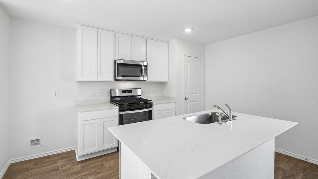 Furnished interior view inside a new home in Prairie Lakes, Buda (Image 7).