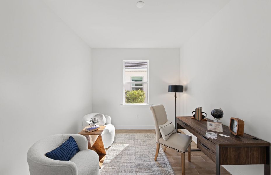 Furnished interior view inside a new home in TerraWalk at Babcock Ranch, Alva (Image 8).
