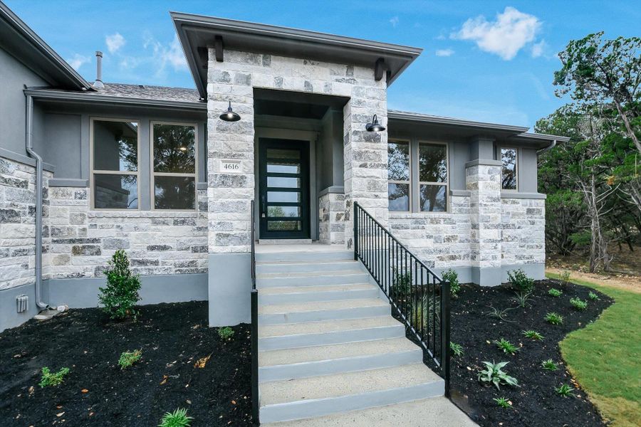 Exterior details and patio area of a home in The Hollows on Lake Travis, Leander (Image 4).