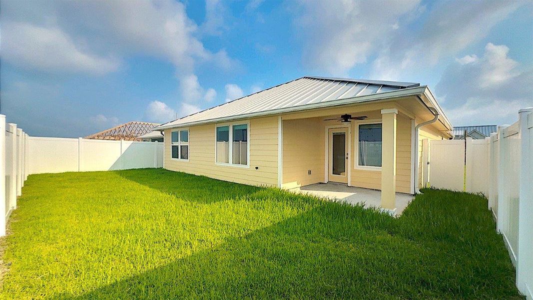 Exterior details and patio area of a home in The Islands of Rockport, Rockport (Image 3). Exterior details and patio area of a home in The Islands of Rockport, Rockport (Image 3).
