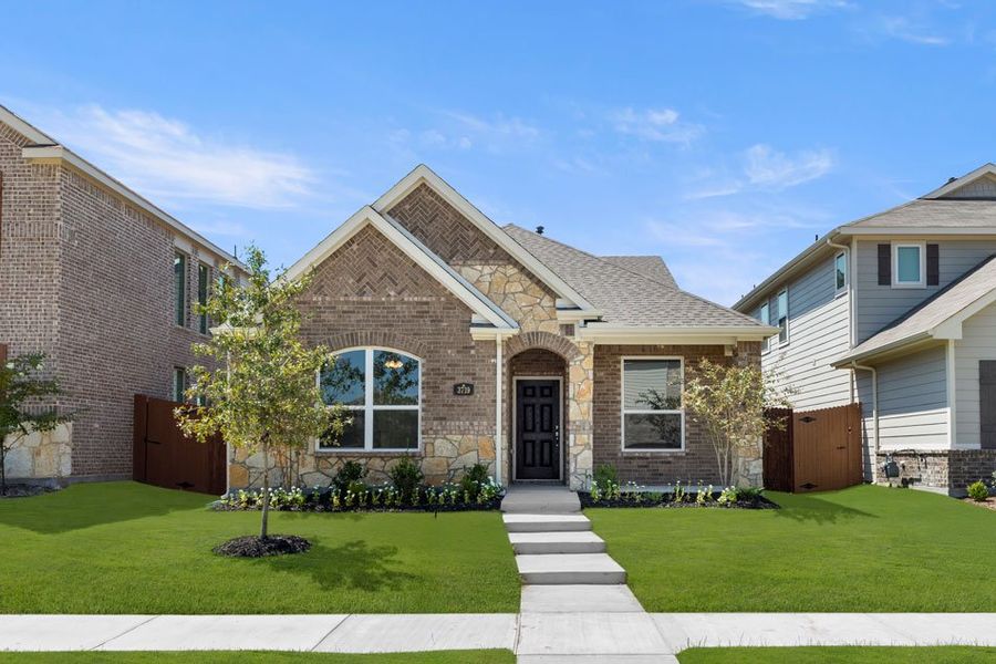 Front exterior of a new home in Heartland, Heartland, TX, highlighting curb appeal (Image 20). Front exterior of a new home in Heartland, Heartland, TX, highlighting curb appeal (Image 20).