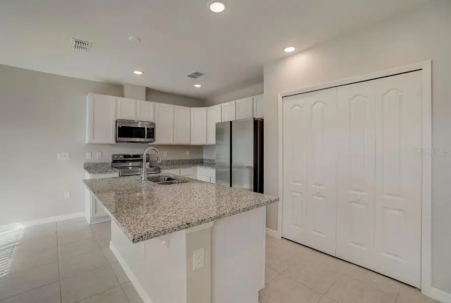 Furnished interior view inside a new home in Royal Highlands, Weeki Wachee (Image 8).